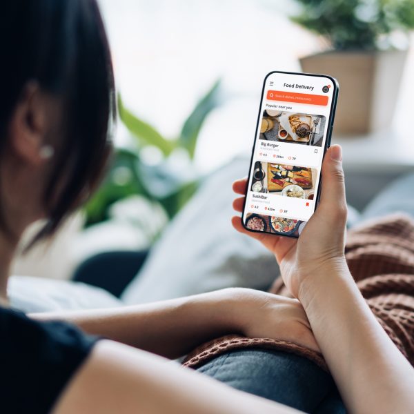 65c18bffd0cca7efb99bbe71_restaurant-online-ordering-woman.jpg